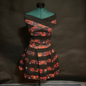 Guess Black and Red Top with Striking Design